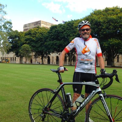 Emeritus Professor Ken Collerson with his beloved bike in UQ's Great Court.